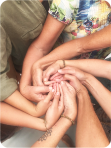 Hands intertwined into a spiral