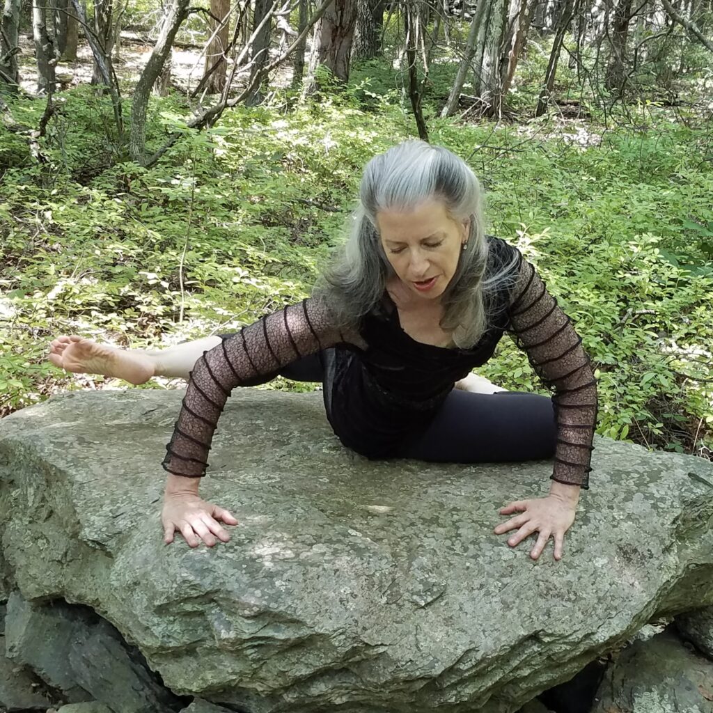 Elaine Colandrea practices Continuum Movement Practice outdoors.