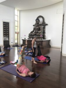 Amba Winkler helps yoginis with yoga nidra
