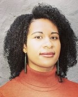 black woman in red turtleneck