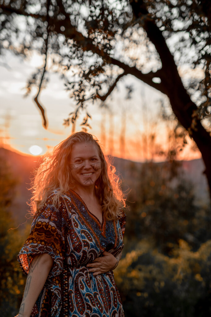 sunset behind Intuitive Kasham mushroom retreat facilitator