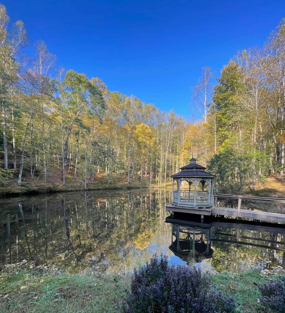 View of the pond with a lovely gazebo at Sanctuary